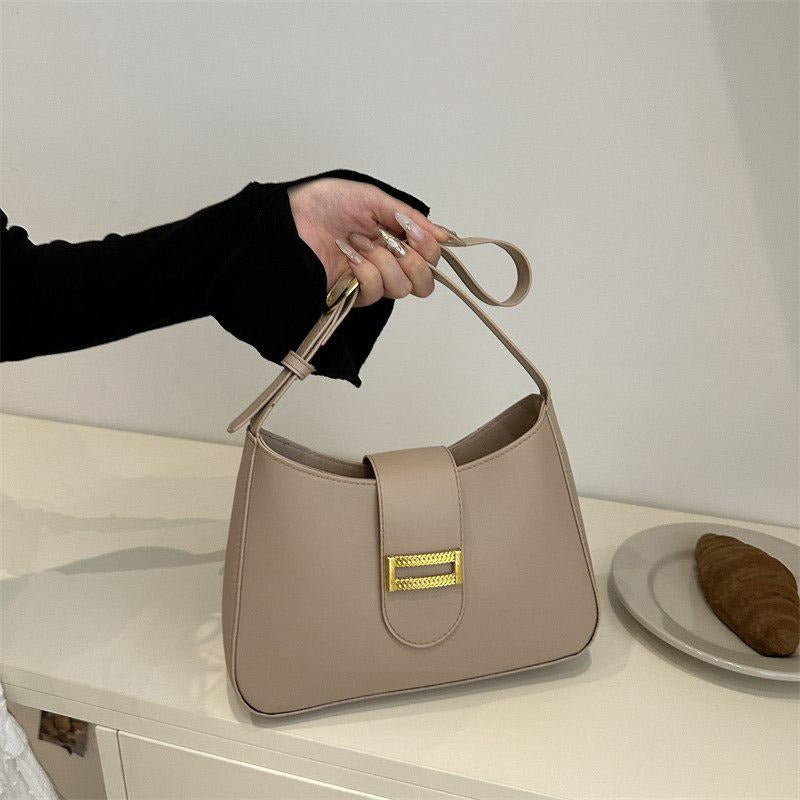 CARTERA PEQUEÑA TIPO LUNA BEIGE / NEGRA
