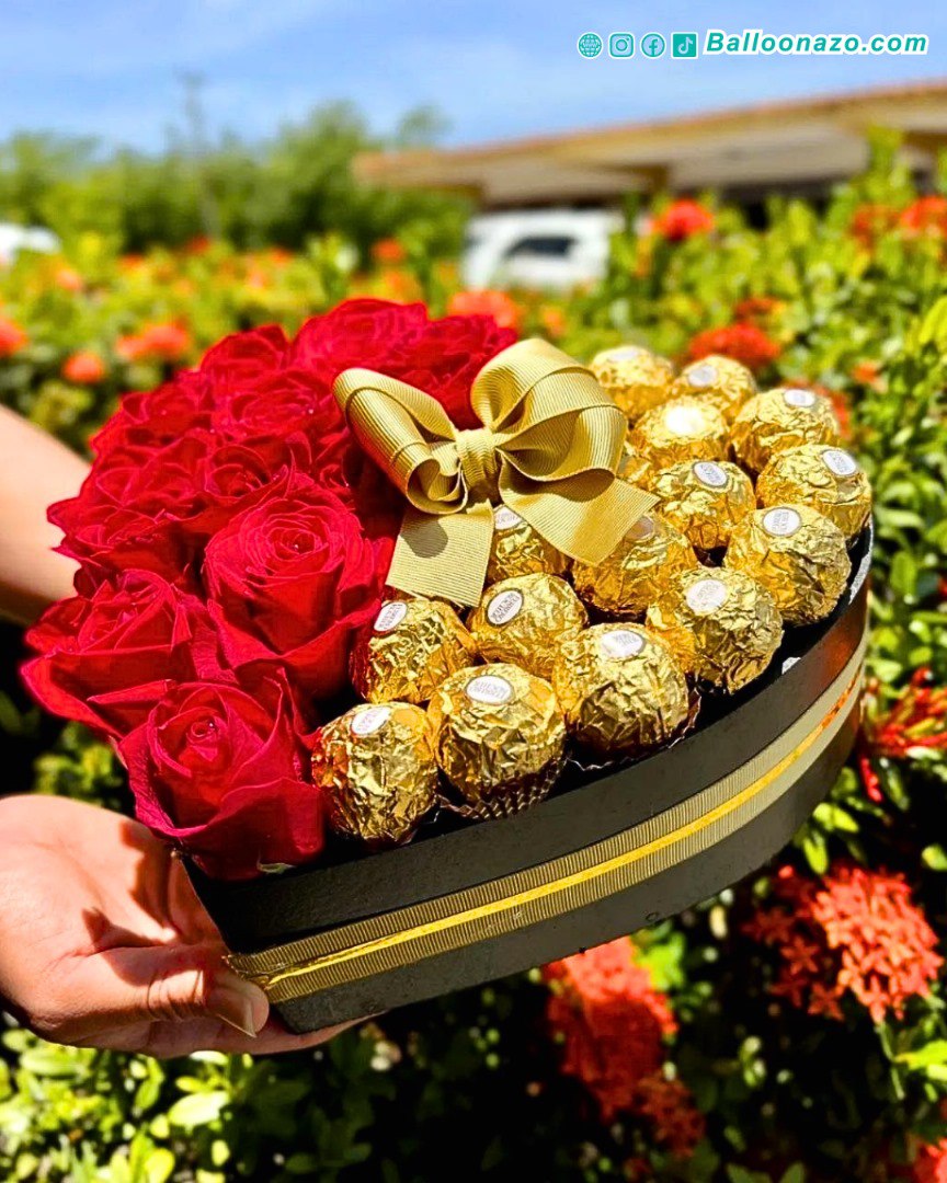 Arreglo de flores y ferreros