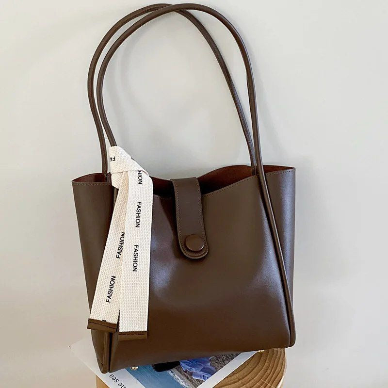 CARTERA ASA CON BUFANDA