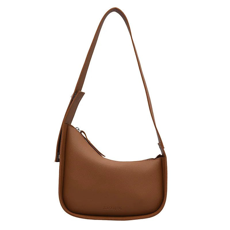 CARTERA PEQUEÑA TIPO LUNA CON BROCHE DE LADO