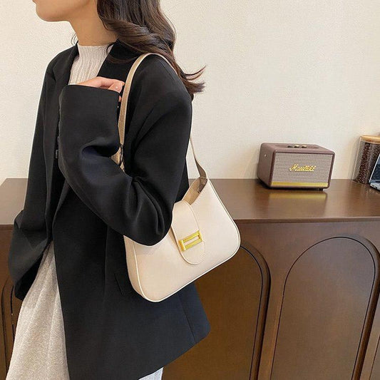 CARTERA PEQUEÑA TIPO LUNA BEIGE / NEGRA