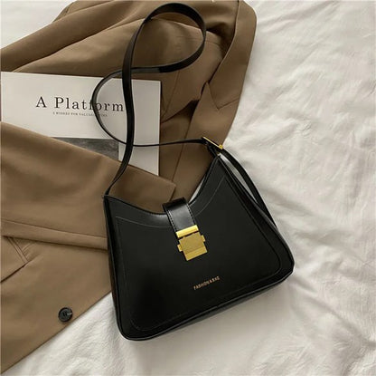 CARTERA MEDIA LUNA CON BROCHE