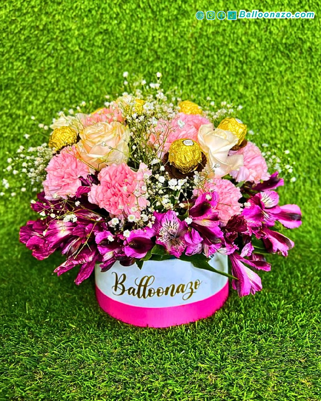 Arreglo floral con ferreros