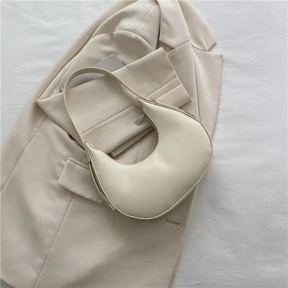CARTERA MEDIA LUNA CON BROCHE